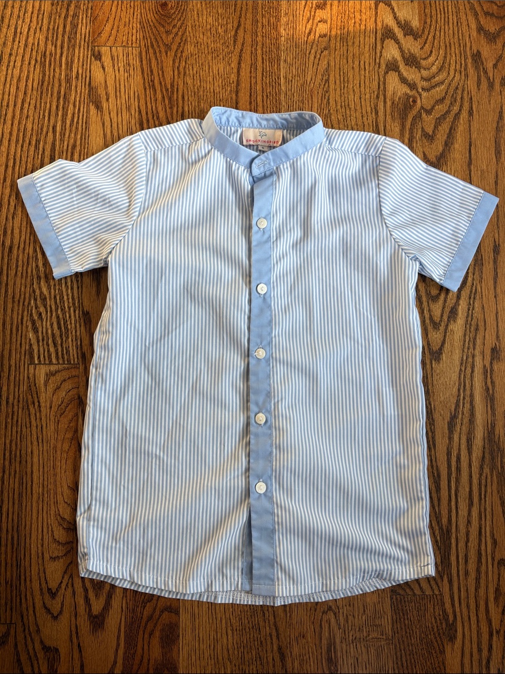 Boys Smockingbird blue and white striped short sleeve button down shirt, size 6.
